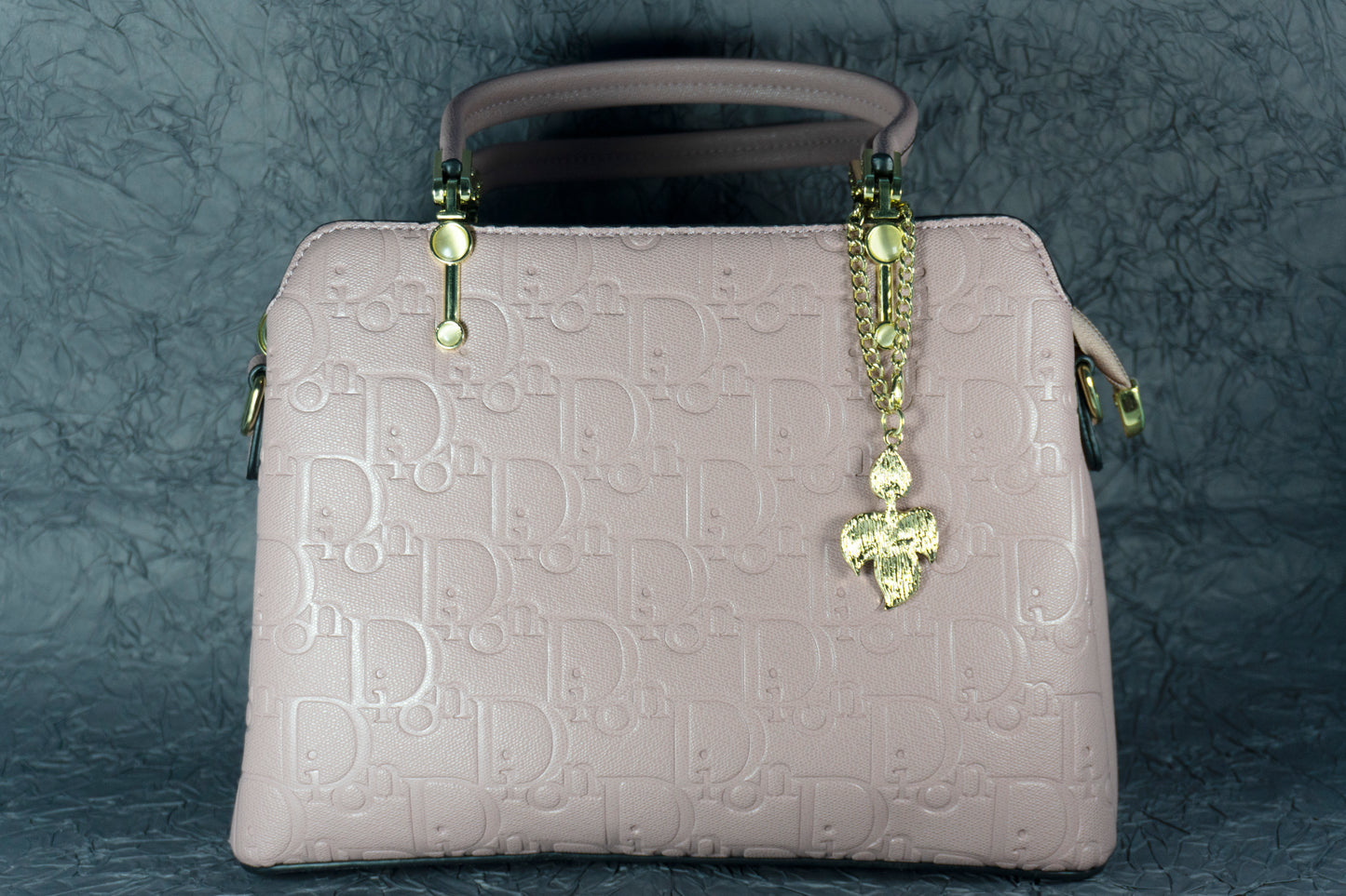 Blush Pink Embossed Handbag with Gold Chain Charm
