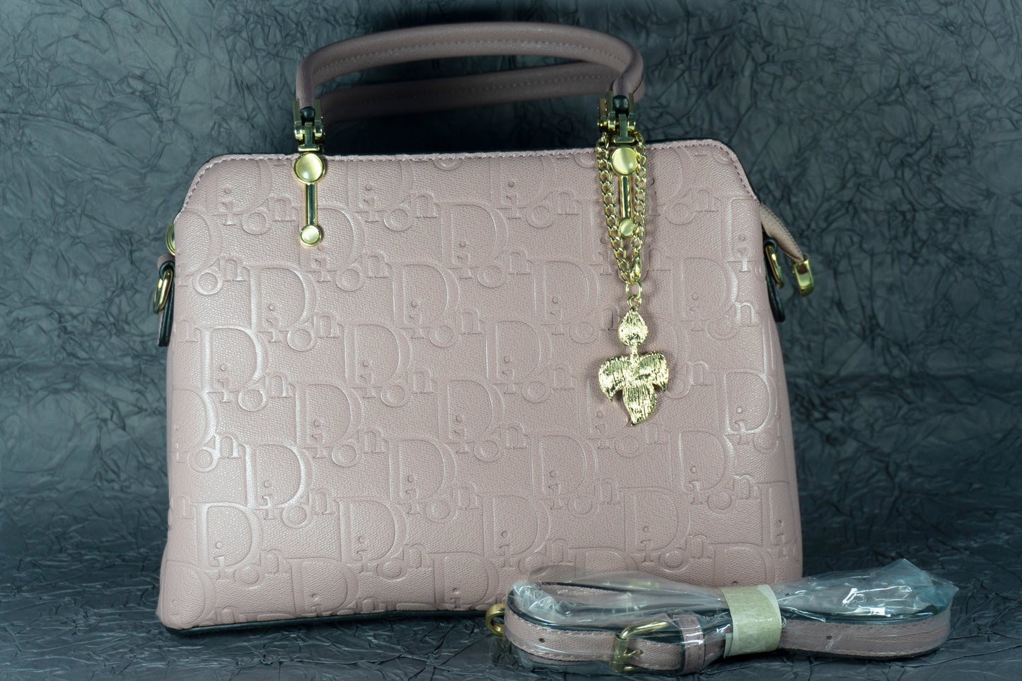Blush Pink Embossed Handbag with Gold Chain Charm