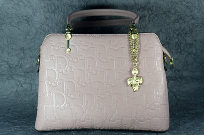 Blush Pink Embossed Handbag with Gold Chain Charm